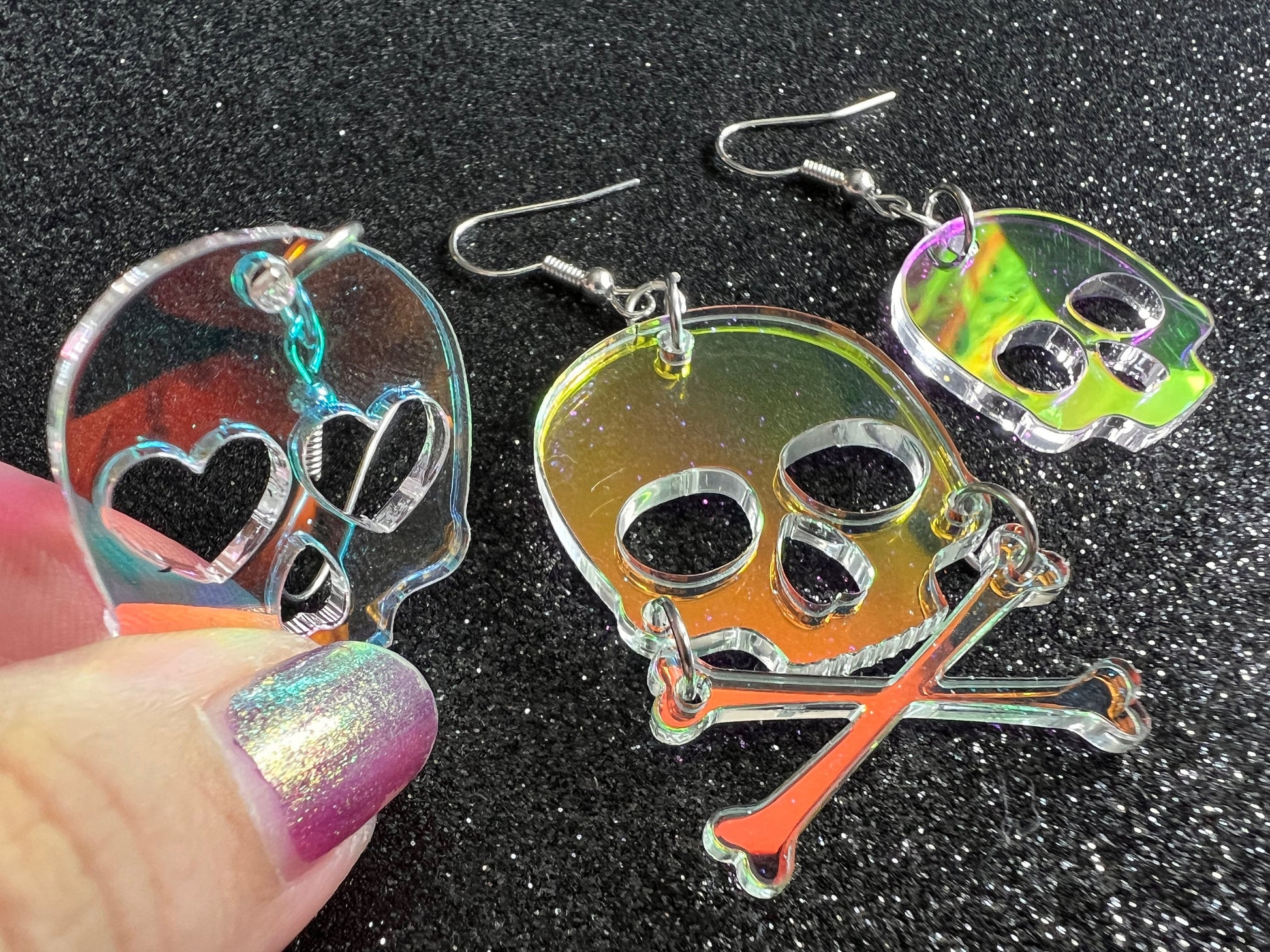 Iridescent Skull Earrings with Heart: Laser Cut Acrylic Skulls, Halloween, Cross Bones, Psychedelic, Gifts for Her/Him/Them
