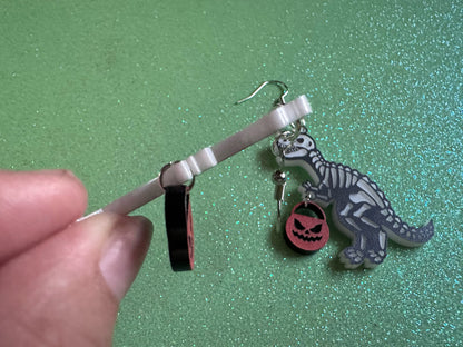 T-Rex Skeleton Earrings: Laser Cut Acrylic Dinosaurs with Jack-o-Lanterns, Halloween, Trick or Treat, Pumpkin, Best Gifts for Her/Him/Them