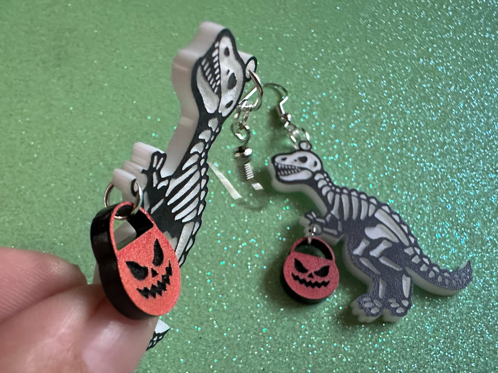 T-Rex Skeleton Earrings: Laser Cut Acrylic Dinosaurs with Jack-o-Lanterns, Halloween, Trick or Treat, Pumpkin, Best Gifts for Her/Him/Them