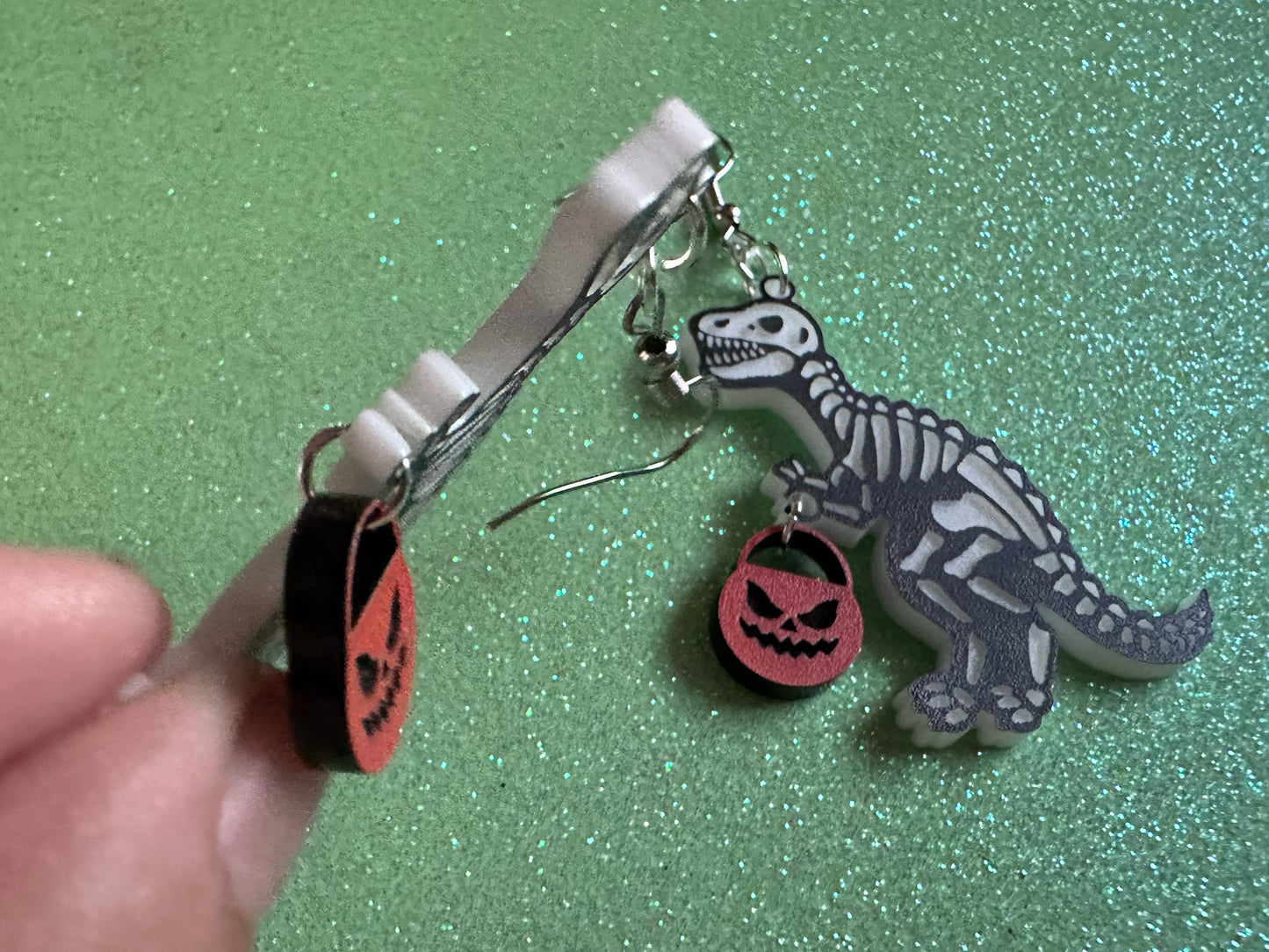 T-Rex Skeleton Earrings: Laser Cut Acrylic Dinosaurs with Jack-o-Lanterns, Halloween, Trick or Treat, Pumpkin, Best Gifts for Her/Him/Them
